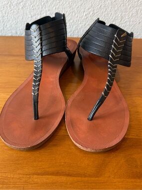 COACH Women’s Black Gladiator T-Strap Sandals with Brown Footbed